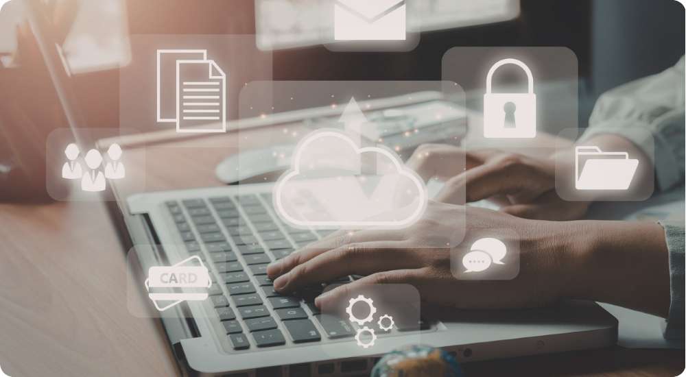 A person's hands typing on a laptop keyboard, overlaid with digital icons representing cloud computing, data security, team collaboration, and financial operations.