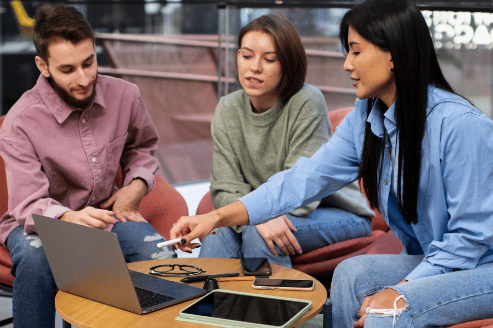 IT professionals collaborating as an extended staff augmentation team on a project